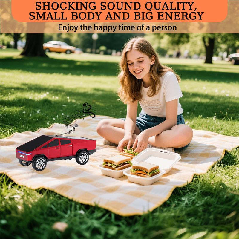 The WSTER WS-580 pickup truck-shaped Bluetooth speaker supports USB, TF card, AUX, FM radio, and TWS pairing.