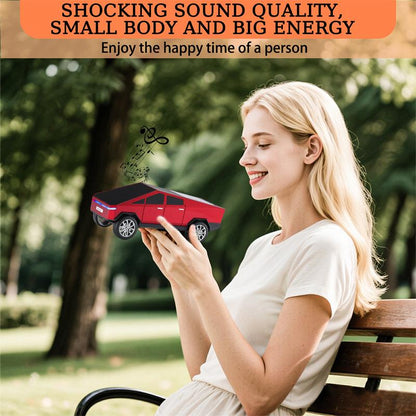 The WSTER WS-580 pickup truck-shaped Bluetooth speaker supports USB, TF card, AUX, FM radio, and TWS pairing.